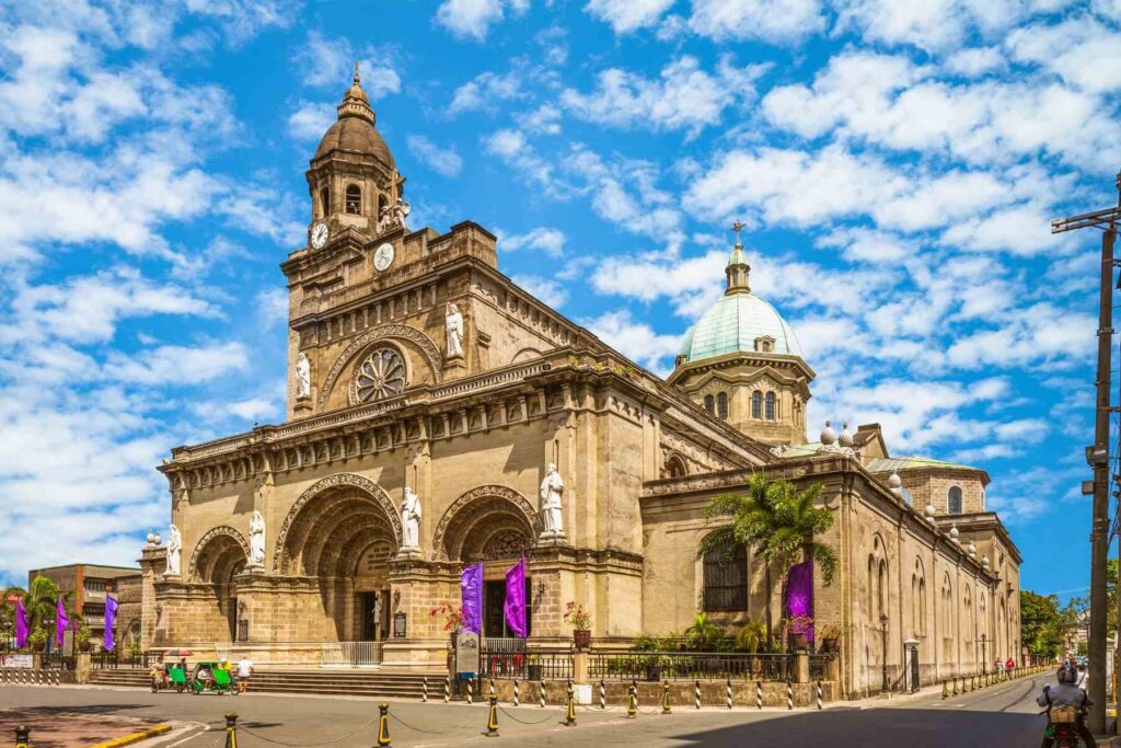 photo of Manila Cathedral with amazing architecture, in Manila's oldest neighborhood Intramuros, Philippines